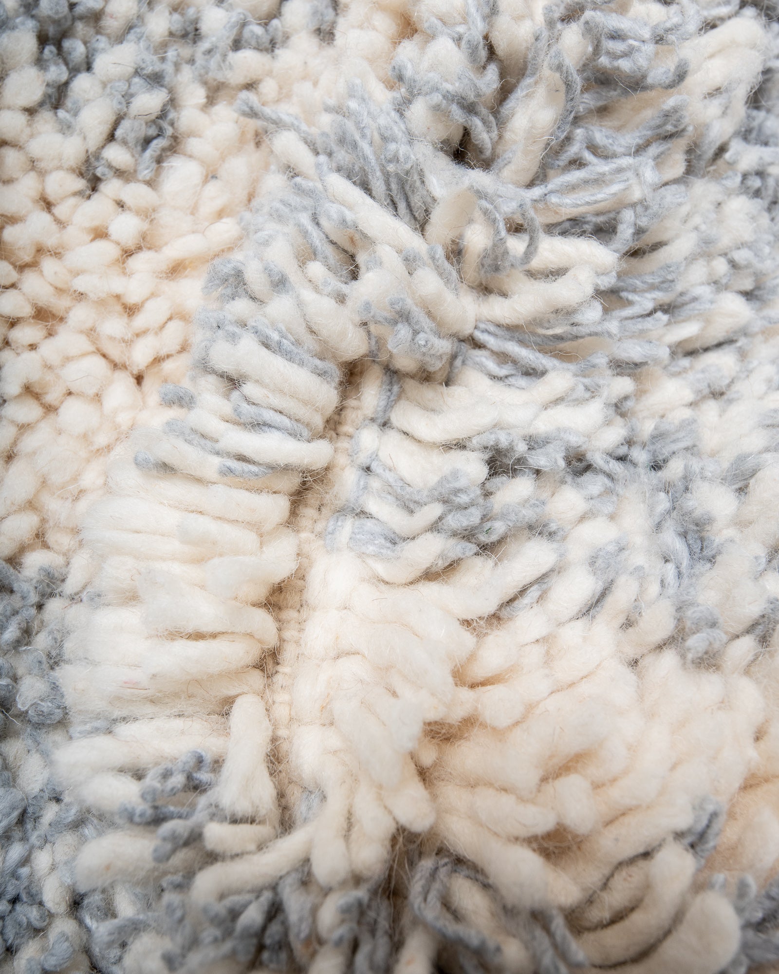 Modern, designer, handcrafted Berber rug from Morocco. Beniourain carpet with beautiful colours and patterns and fluffy wool texture.